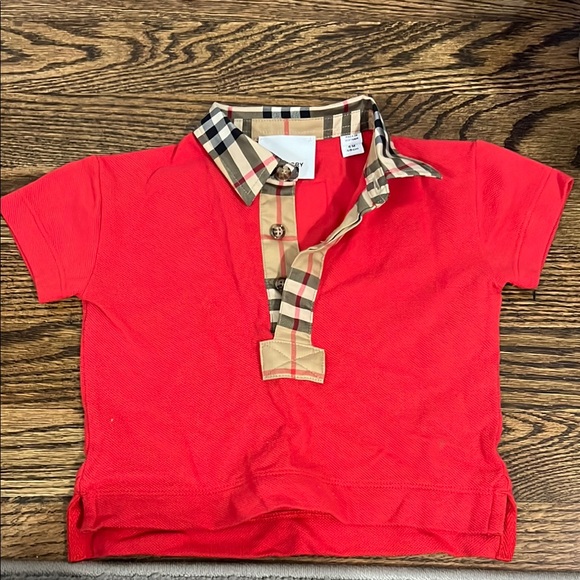 6M Burberry polo 
Purchased from Bloomingdale’s 
Worn 1x - Picture 1 of 2